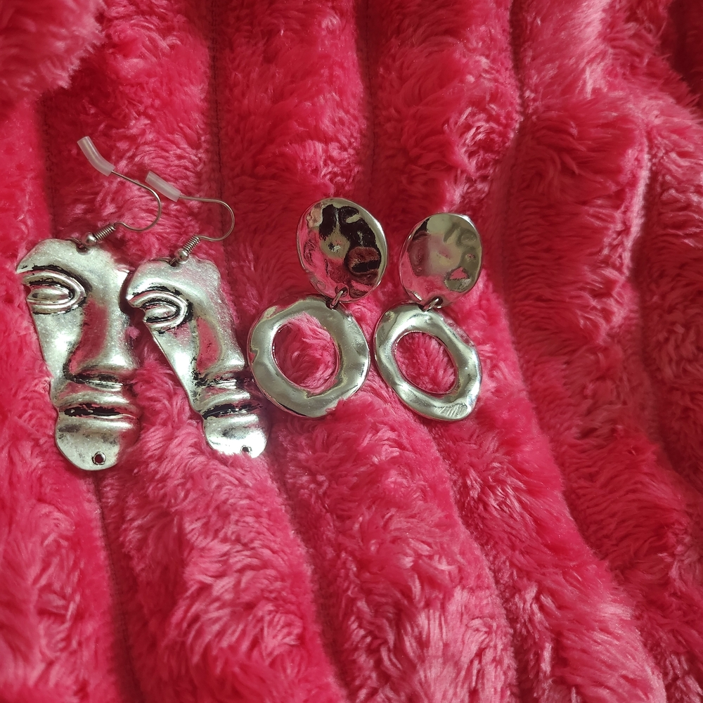 Artistic Silver Face Earrings 2 For 1 Deal